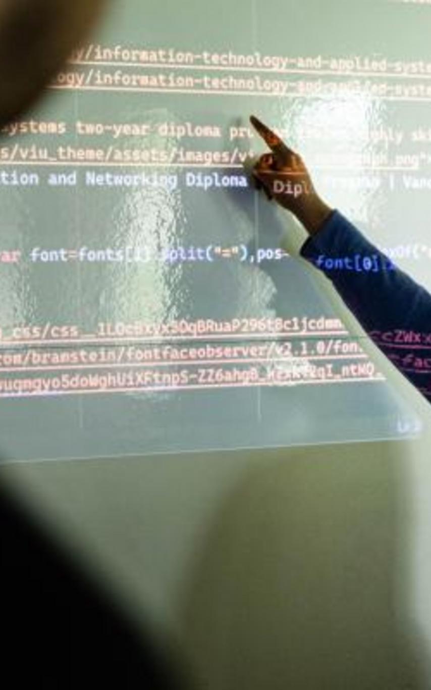 Young female student at a blackboard