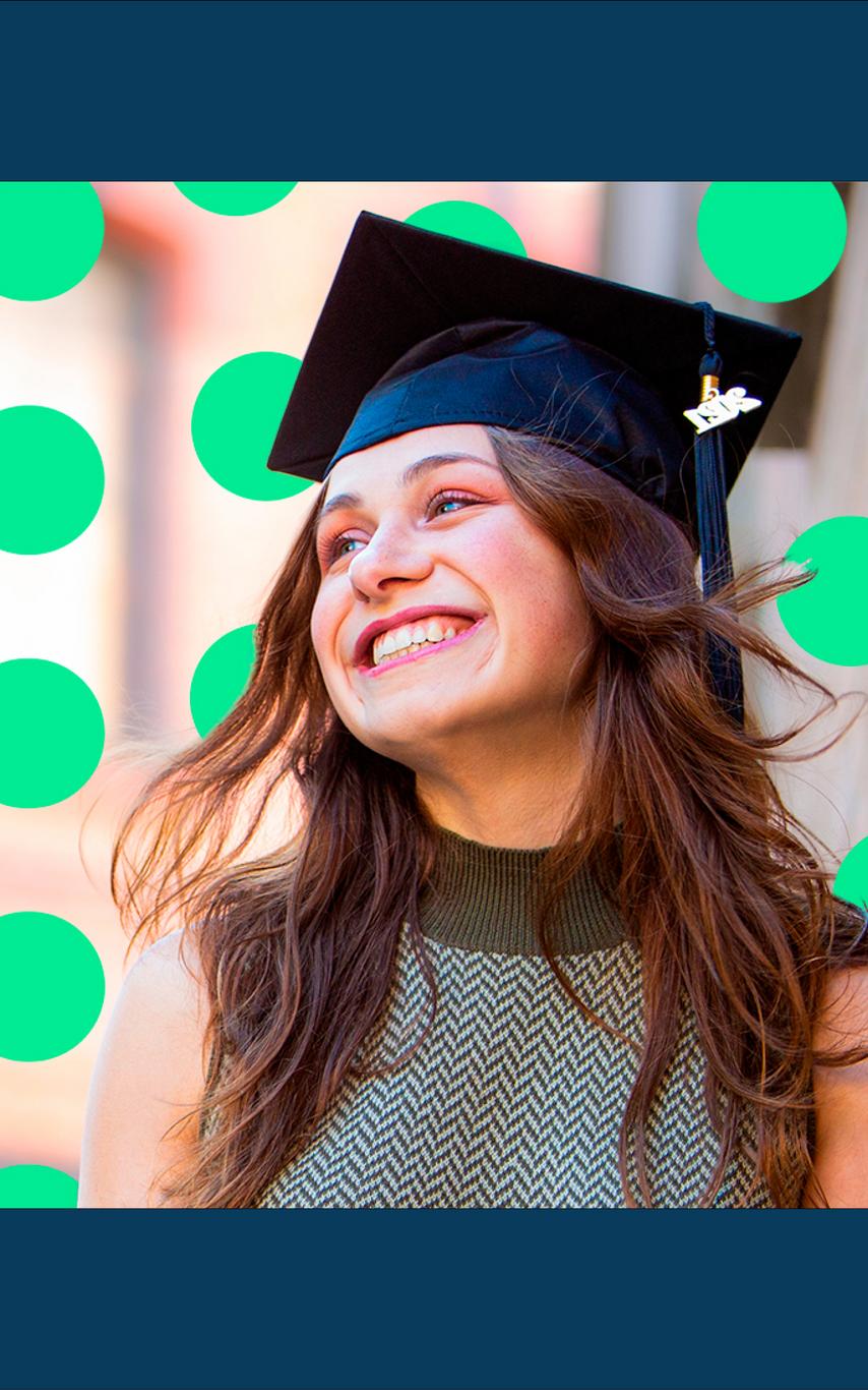 Smiling young woman wearing a graduation cap
